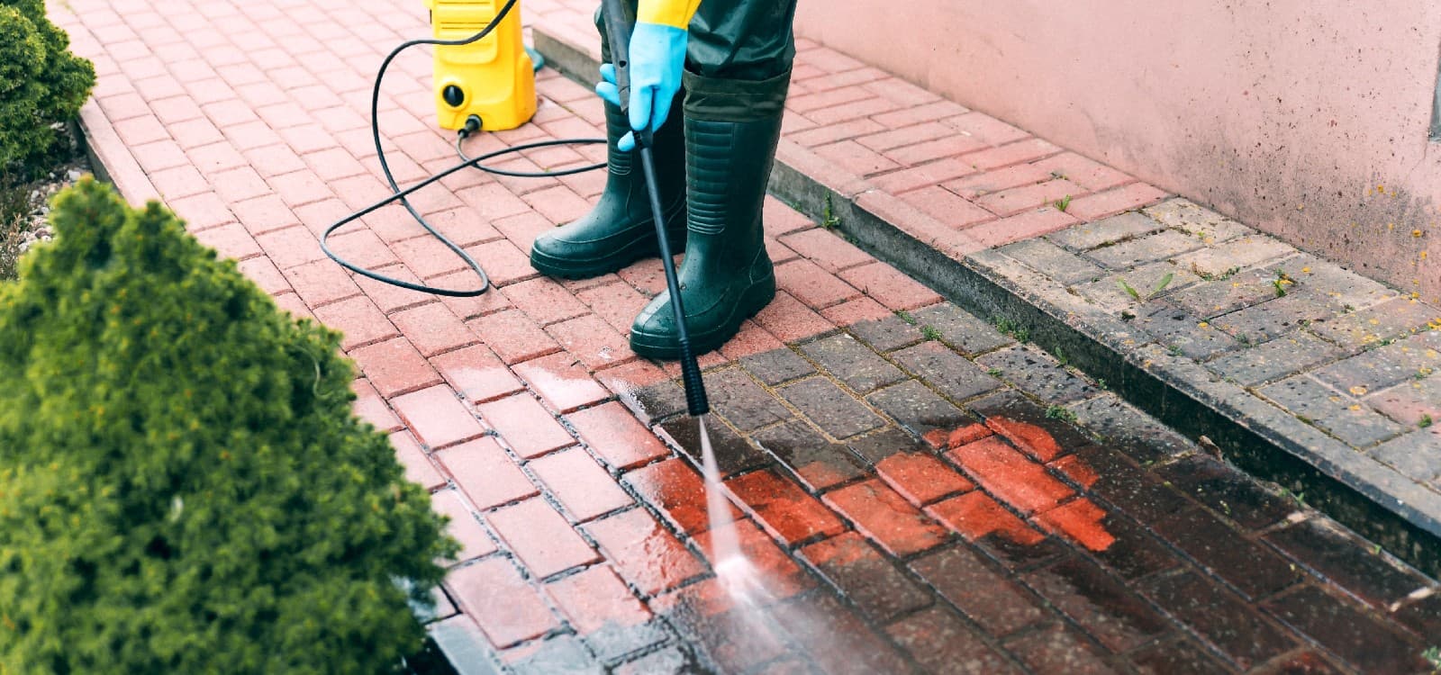 Pressure washing Indian sandstone paving