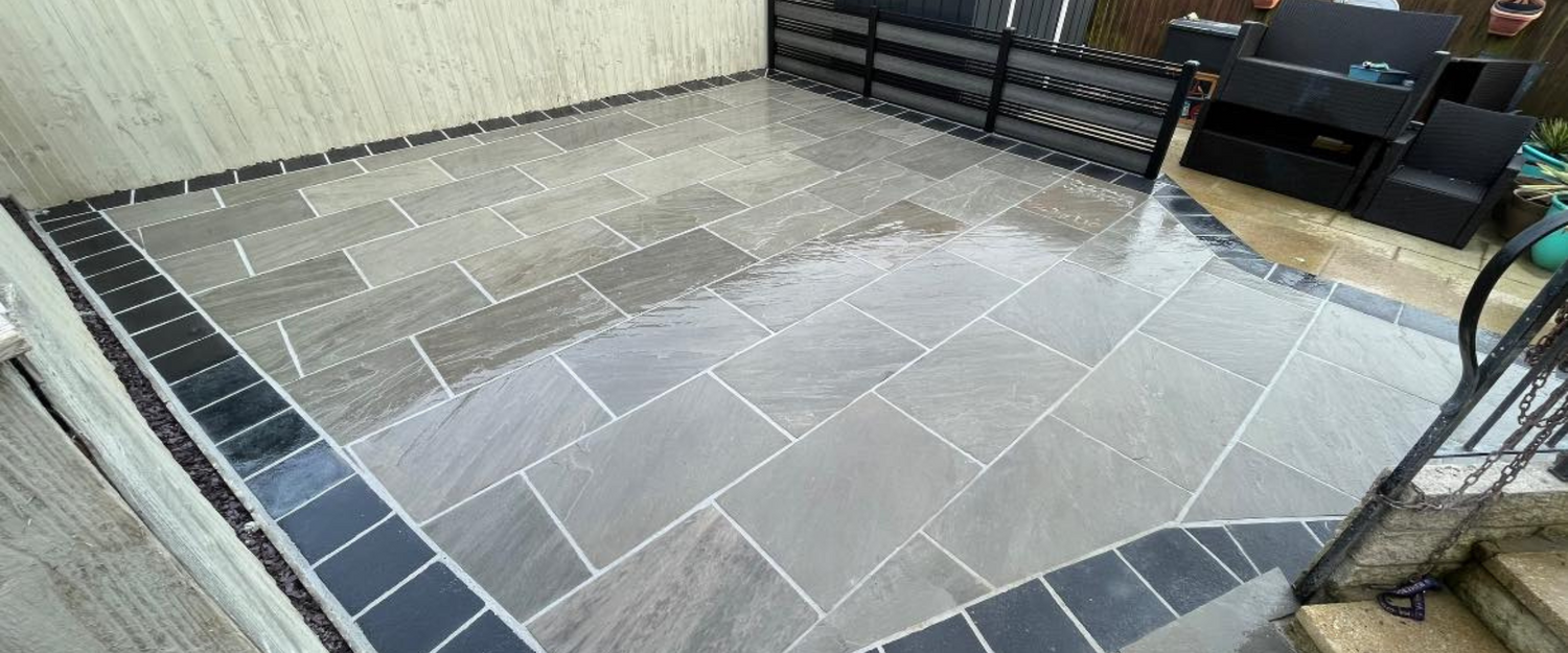 Kandla Grey Indian Sandstone single-size slabs showing natural colour variation—soft grey when dry, deeper and more pronounced tones when wet