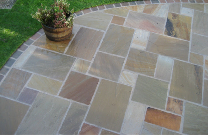 High-quality natural stone paving slabs, including sandstone, limestone, and reclaimed Yorkstone, perfect for patios, pathways, and garden landscaping